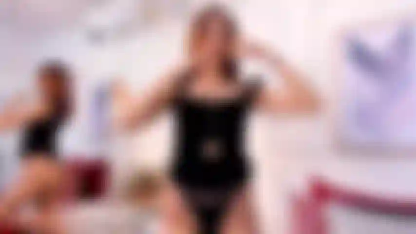 Uso_vestido_preto_e_salto_alto_(vício).