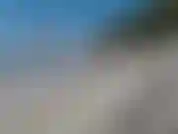 Chillin e fumando um cigarro na praia.