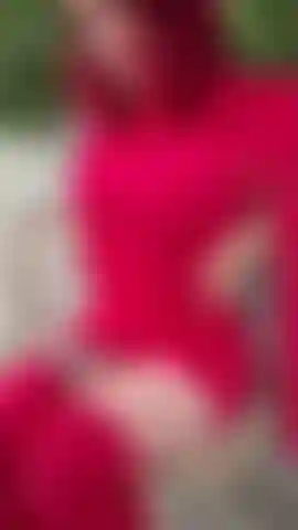 Sexy roof top tease in red dress