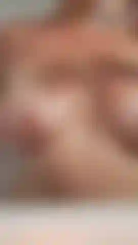 Massaging my juicy tits with oil