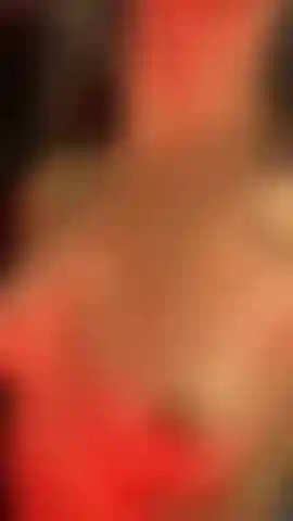 Water being sprayed over my naked tits in slow-motion