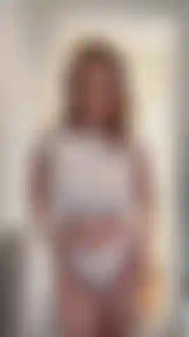 Watch me bounce my big natural breasts in my white tiny top until they pop out ! Do you like my white thong ?