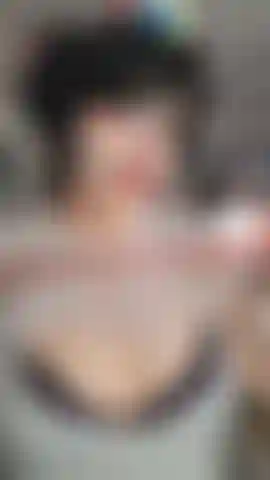 Emo clown girl latex balloon stretching, inflating, rubbing