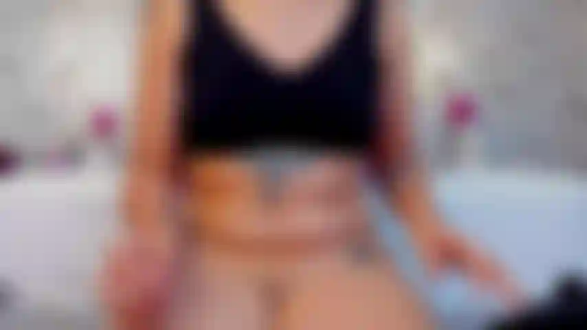 My pussy glistens wet in the foreground... open, wet and so provocative you'll want to lick the screen.