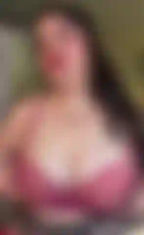 Sucking on my hard nipples wearing a red lipstick and a sexy bra xx