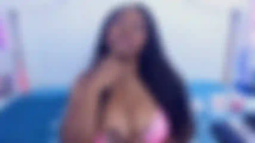 Língua e peitos sensuais.