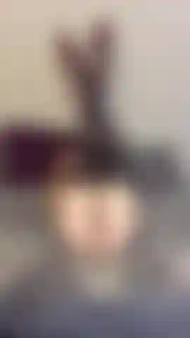 Naked with only my black fishnet thigh, highs on while rubbing my pussy