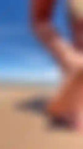 Bare feet into the sand