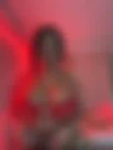 Red looks good on me, moving my ass so tenderly on the table and feeling your fingers all over my body.