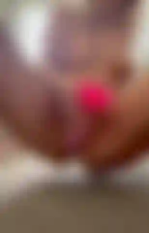 Esguicho de vibrador rosa.