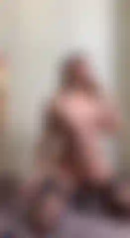 I'm kneeling before you, wearing only stockings.