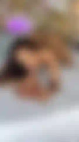 Maia has fun riding her big black torso they are tight