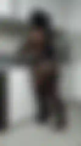 Cleaning the kitchen turning up the heat