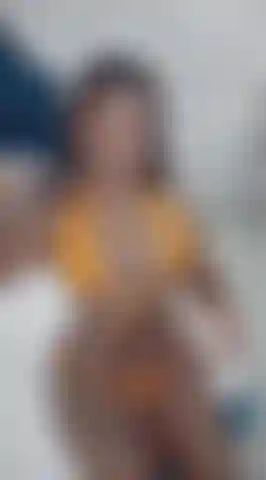 The oil highlights every curve of my body.