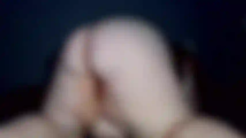 Spreading ass cheeks with both hands.