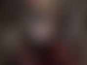 Sua amante, vestida com uma roupa preta brilhante e fetichista, com botas de cano alto, aperta sua bunda e fode seu pau de escravo com seu salto agulha de metal.