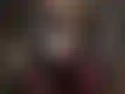 Sua amante, vestida com uma roupa preta brilhante e fetichista, com botas de cano alto, aperta sua bunda e fode seu pau de escravo com seu salto agulha de metal.