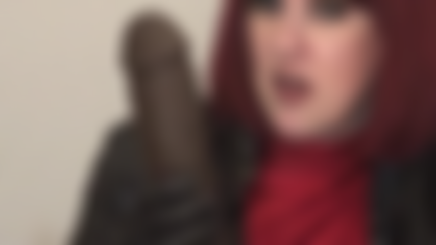 Mistress winks at you while stroking BBC. Won't you give that big black cock a little kiss?
