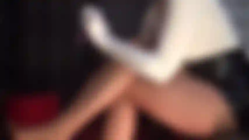 Seductive in purple - Mistress slides on purple lace top stockings, metallic purple ankle strap heels and lace panties.