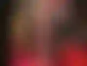 Masturbando um vibrador coberto por uma meia.