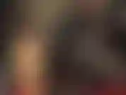 Se você gosta de uma roupa fetichista extra brilhante, então isso é para você - sua amante em um macacão preto brilhante e justo de pvc.