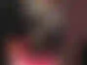 Você pode adorar a deusa, pois ela está vestida com perfeição em pvc preto brilhante e botas de cadarço.