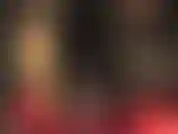 Couro preto quente e casaco de pele longo.