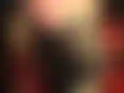 Botas altas de amarrar, meia-calça bege escura brilhante, shorts sensuais e quentes.