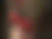 Amante de látex, dominadora de strapon, com um pau preto enorme.