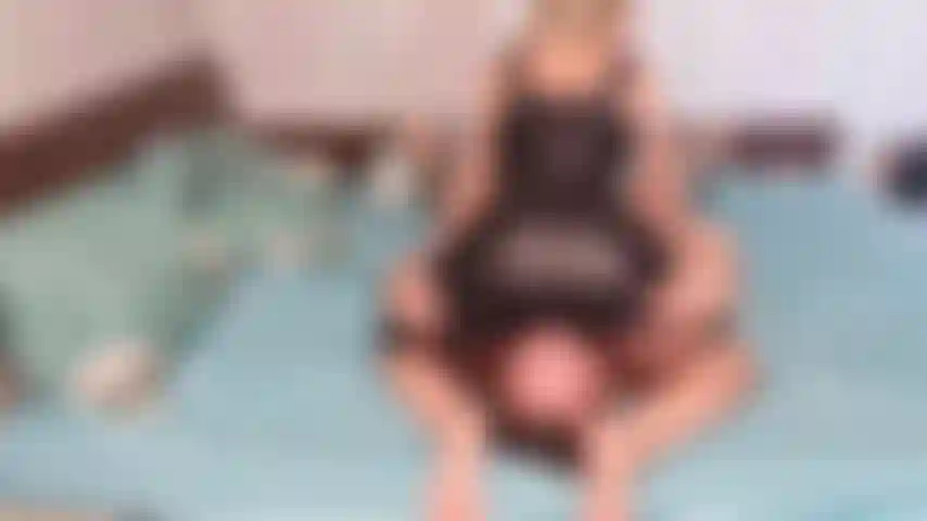 face sitting with latex dress on