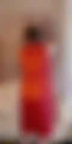 stripping out of my vintage dress.and red bra, i sit down and give myself a good tug and push on my clit and mound and lips .. no underwear on as i love a breeze up my dress.