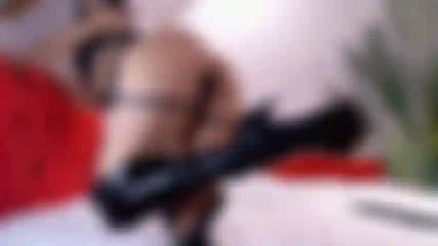 A soft, playful tease that leaves a little to the imagination.