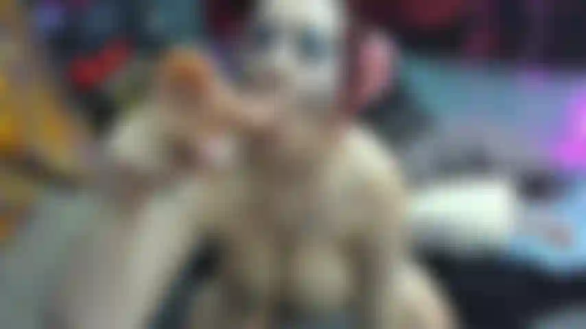 GOTH SLUT SUCKS 2 COCKS SIMULTANEOUSLY