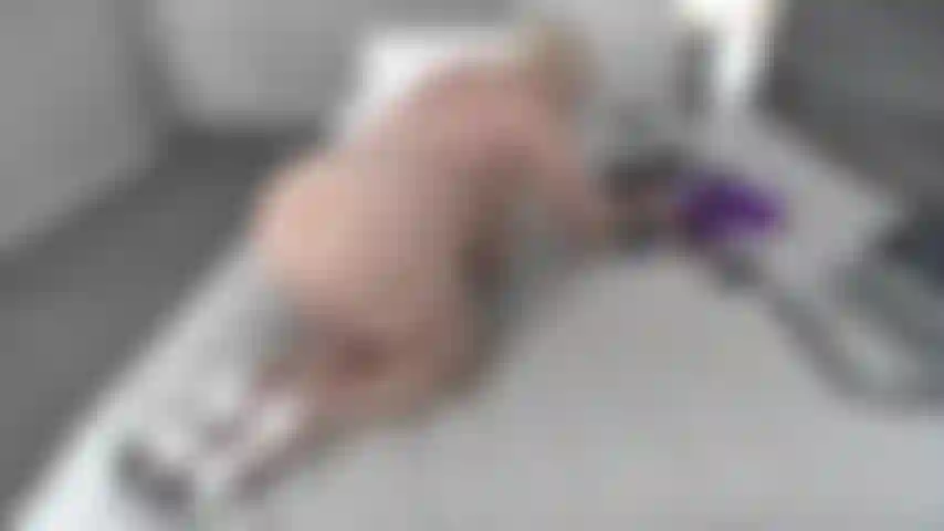 SIDEWAYS ON THE BED WITH LEGS TOGETHER & WHITE HIGH HEELS---