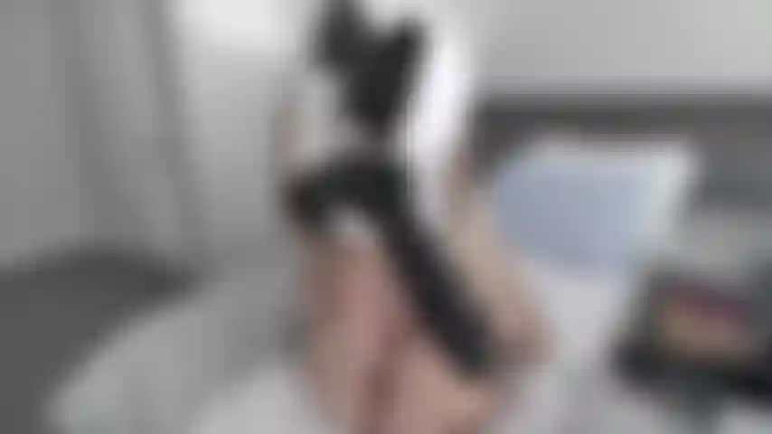 WHITE HIGH HEELS WITH BLACK TOY DANGLING---TELLING YOU TO CUM ON MY HIGH HEELS & TOES--SHOWING SOME PUSSY