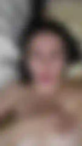 Naked, elegant on my bed with a look that speaks