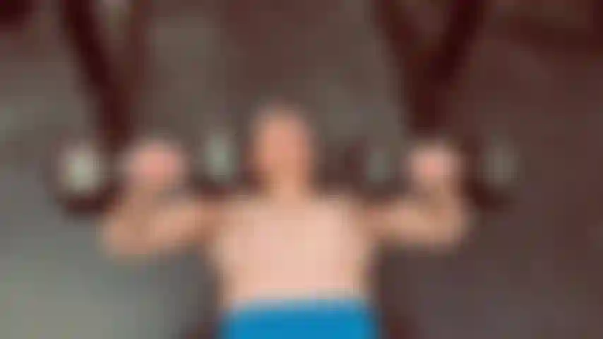 Morning Lift - Starting the day strong—topless dumbbell presses with natural light streaming in. Real workout, real body, no filter.--topless, breasts, fitness, workout, natural, athletic--